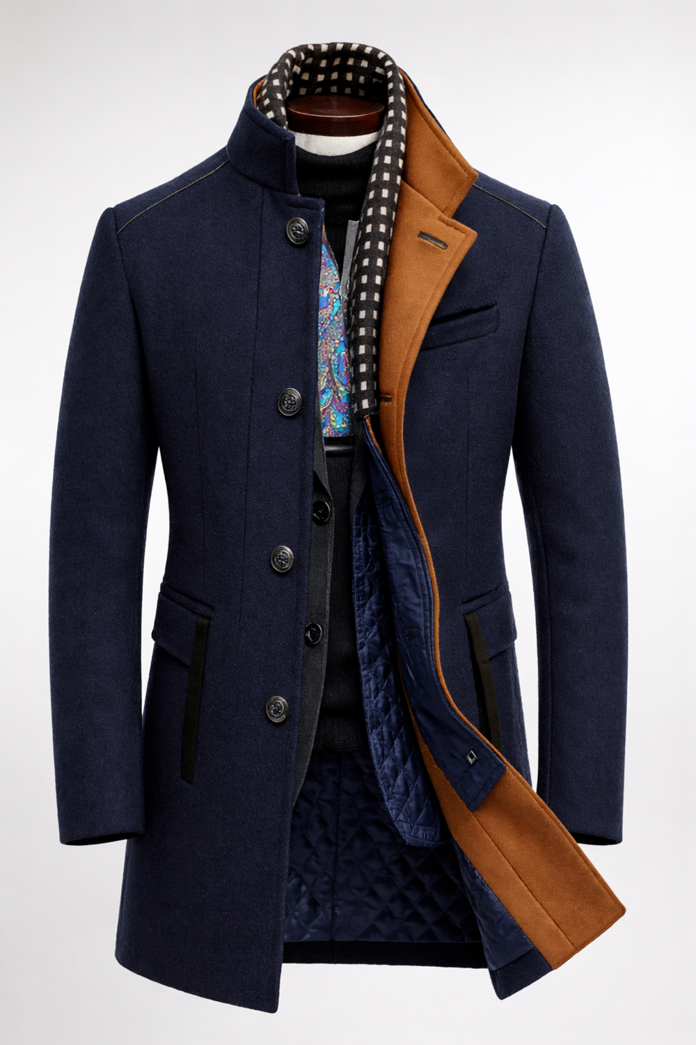 Front view showing stand collar, button placket, welt pockets and quilted interior panel, navy blue