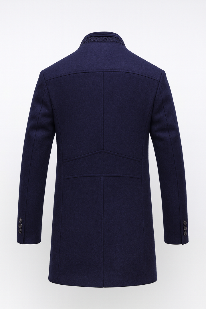 Back view showing stand collar, back seams and banded cuffs