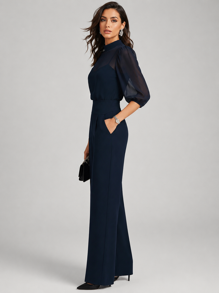 Side view showing puff sleeves, side pocket and wide legs