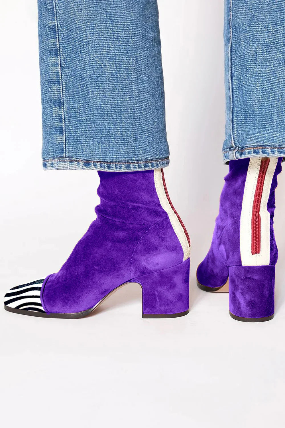 Side view showing back zip, side stripe and block heel, royal purple