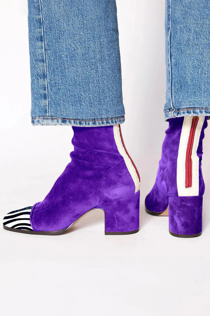 Side view showing back zip, side stripe and block heel, royal purple