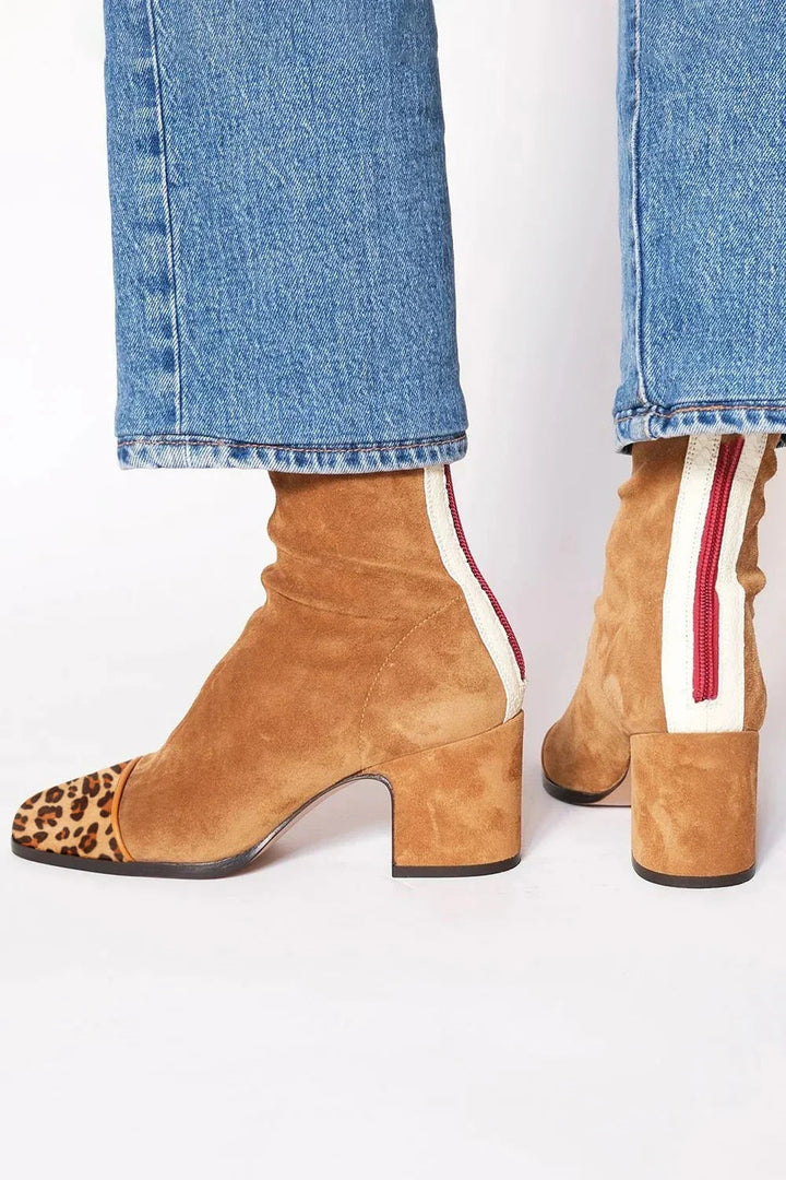 Back view showing back zip, side stripe and block heel, stone beige