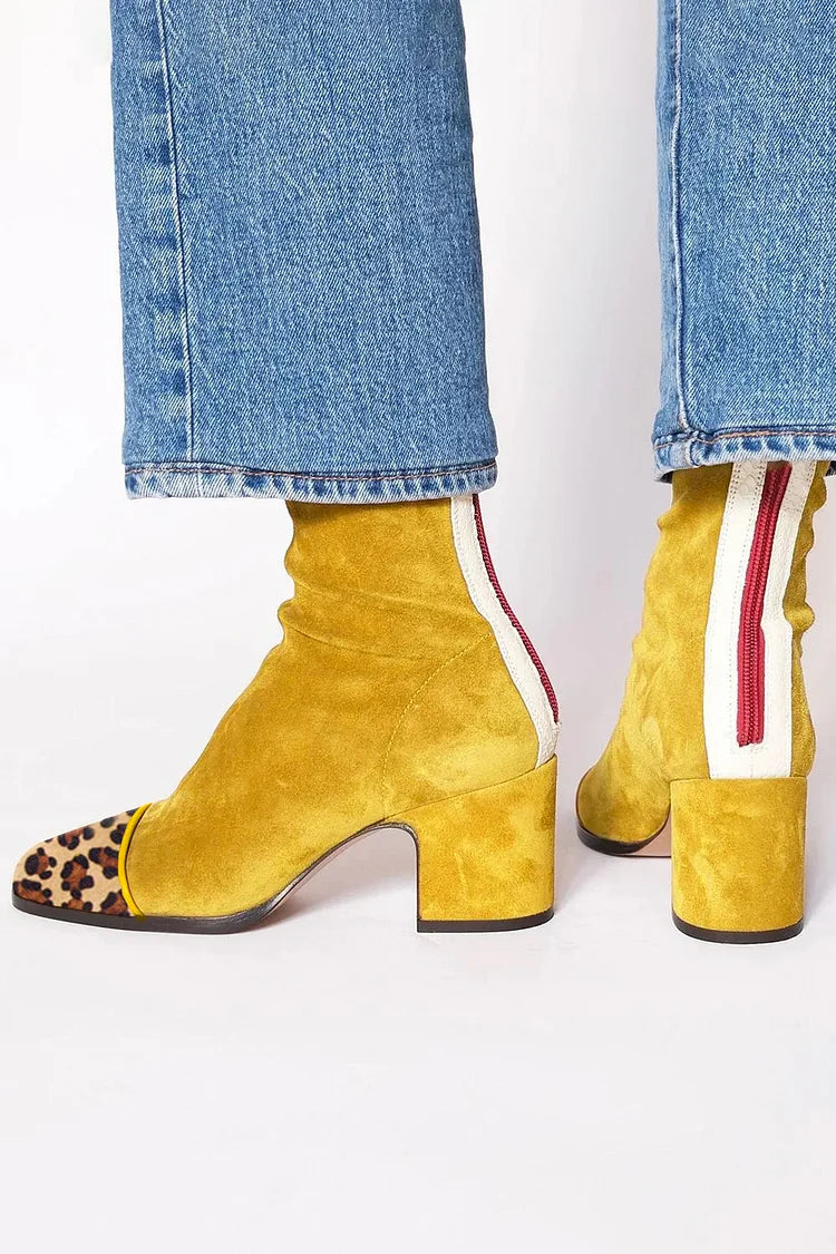 Back view showing back zip, side stripe and block heel, golden mustard