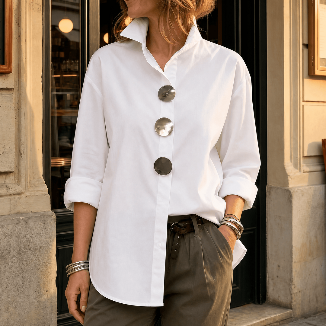 Front view showing stand collar, button front and long sleeves, white
