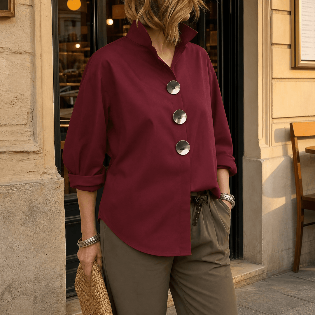 Front view showing stand collar, button front and shirttail hem, burgundy