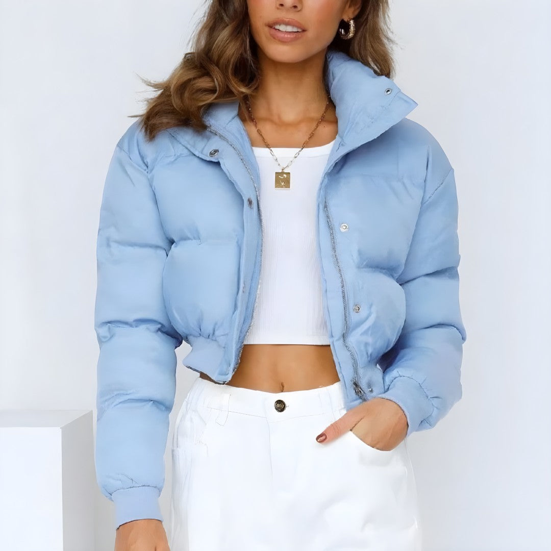Front view showing stand collar, zip front and cropped hem, niebieski