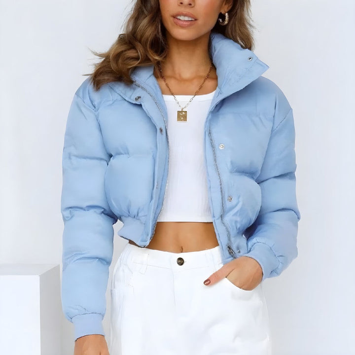 Front view showing stand collar, zip front and cropped hem, niebieski
