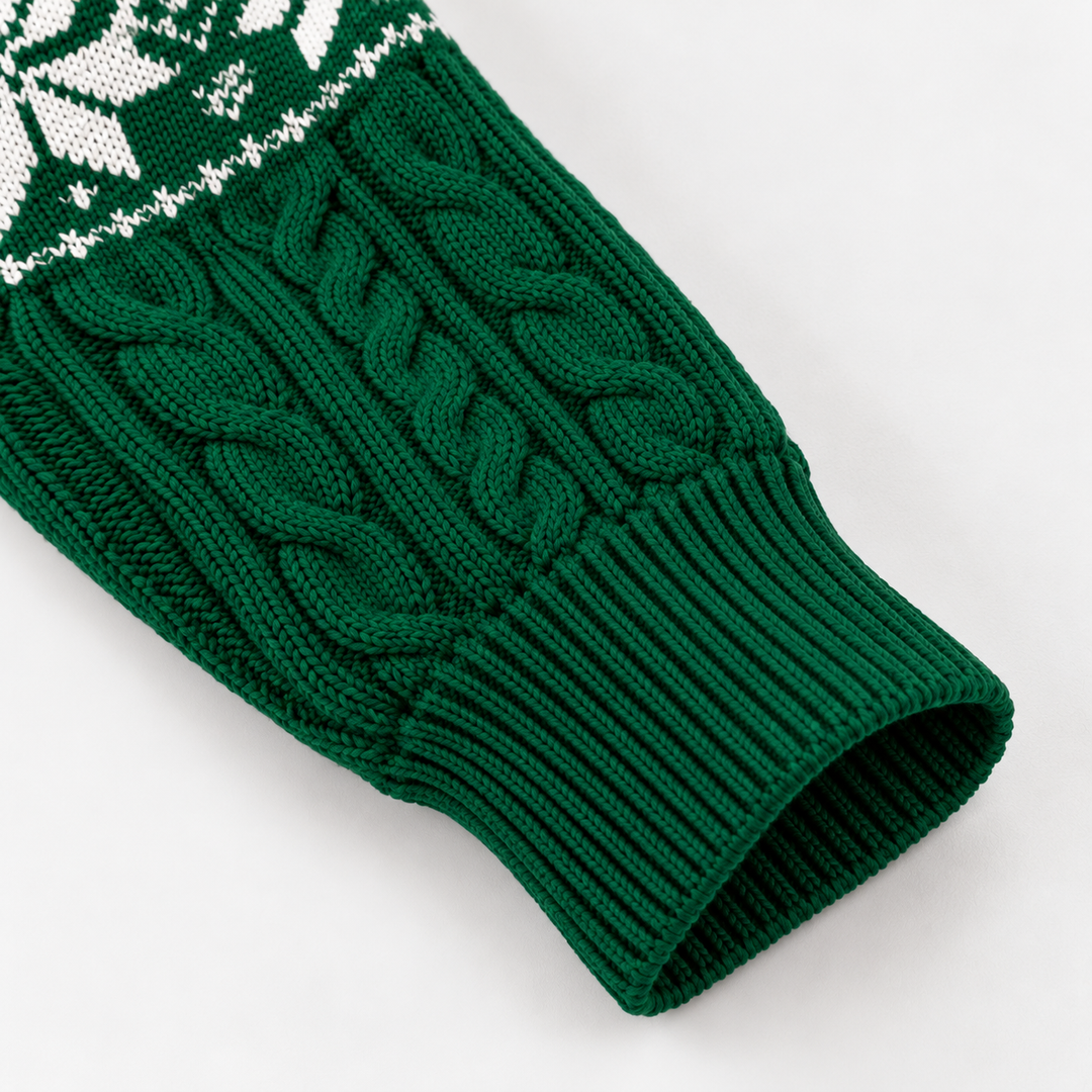 Detail view of cable-knit sleeve and ribbed banded cuff