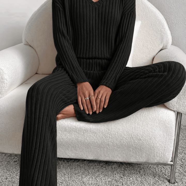 Front view showing long sleeves, banded waist and wide legs