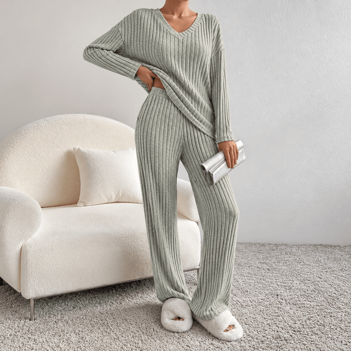 Front view showing v-neckline, long sleeves and wide legs, sage green