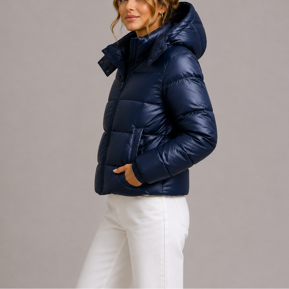 Side view showing hood, stand collar and side pocket, navy