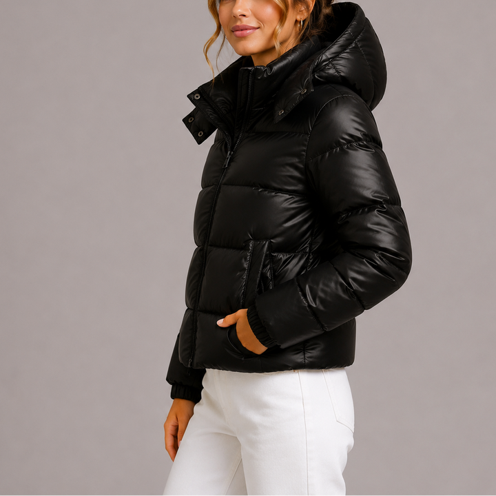 Side view showing hood, stand collar and side pocket, black