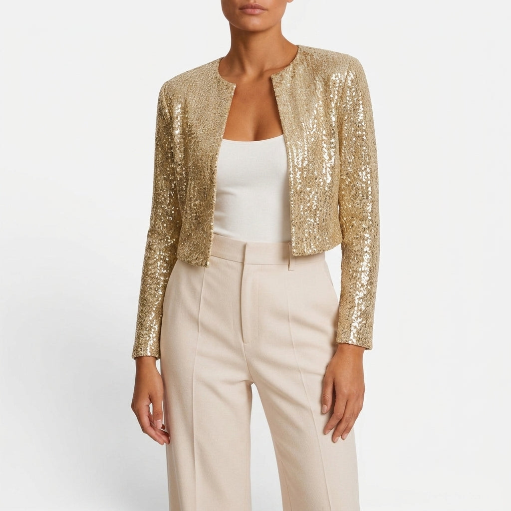 Front view showing round neckline, open front and allover sequins, gold