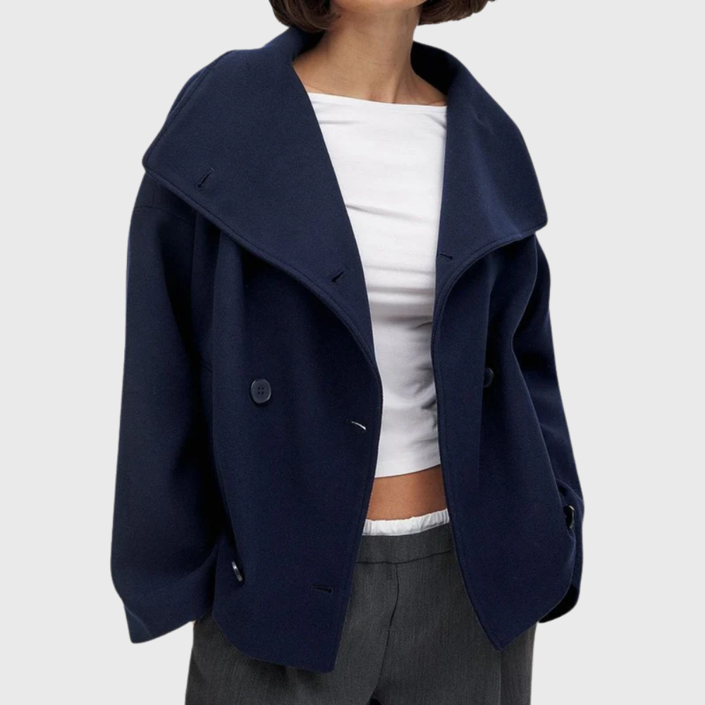 Front view showing wide lapels, double-breasted buttons and side pockets