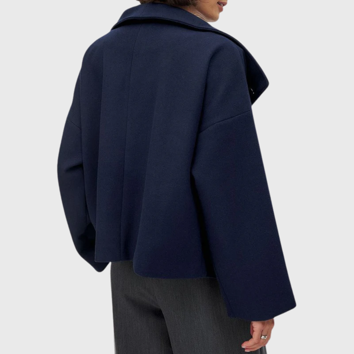 Back view showing collar, dropped shoulder seams and cropped hem