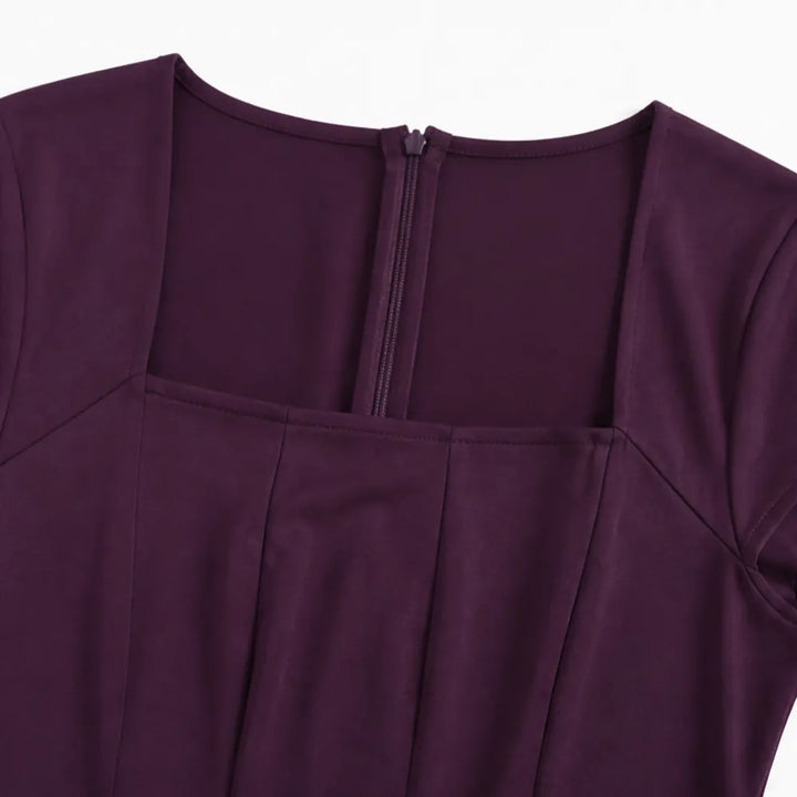 Detail view of square neckline and back zip