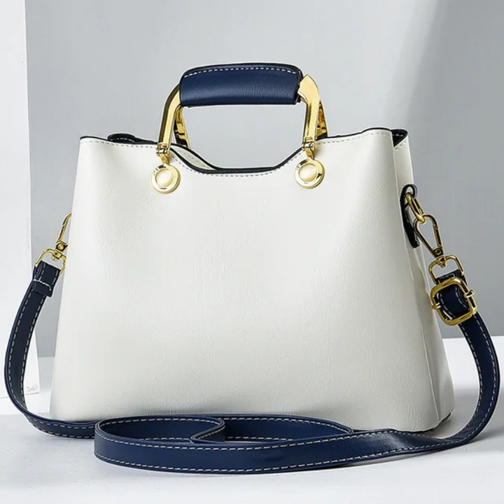 Back view showing plain back body, top handle and strap rings