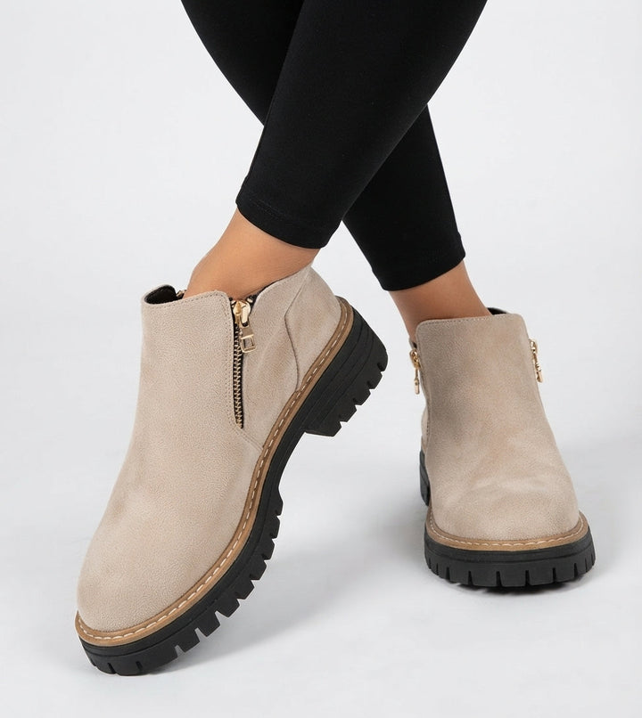 Pair of ankle boots positioned together