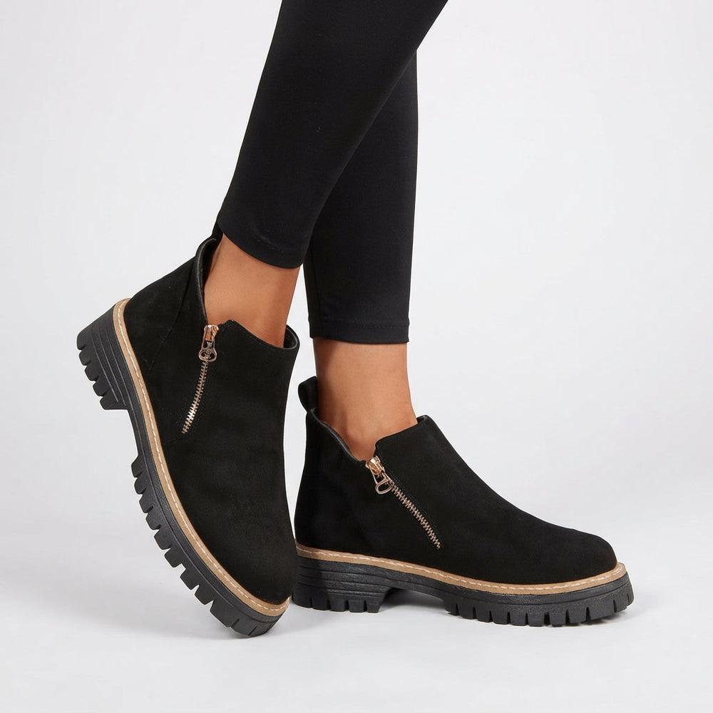 Topstitched panelled upper of the ankle boots