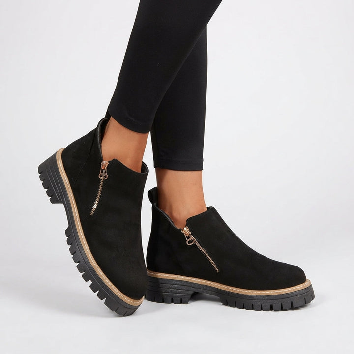 Topstitched panelled upper of the ankle boots