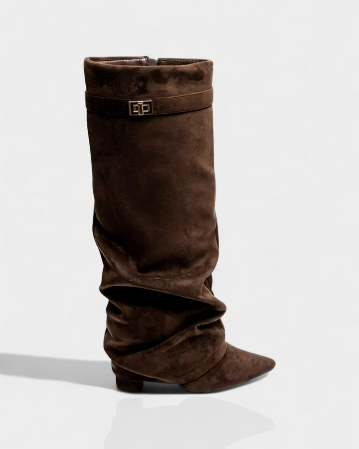 Side view of foldover shaft, turn-lock strap and pointed toe