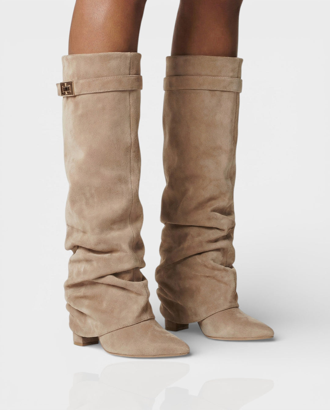Front view of foldover shaft, turn-lock strap, pointed toe and block heel, apricot