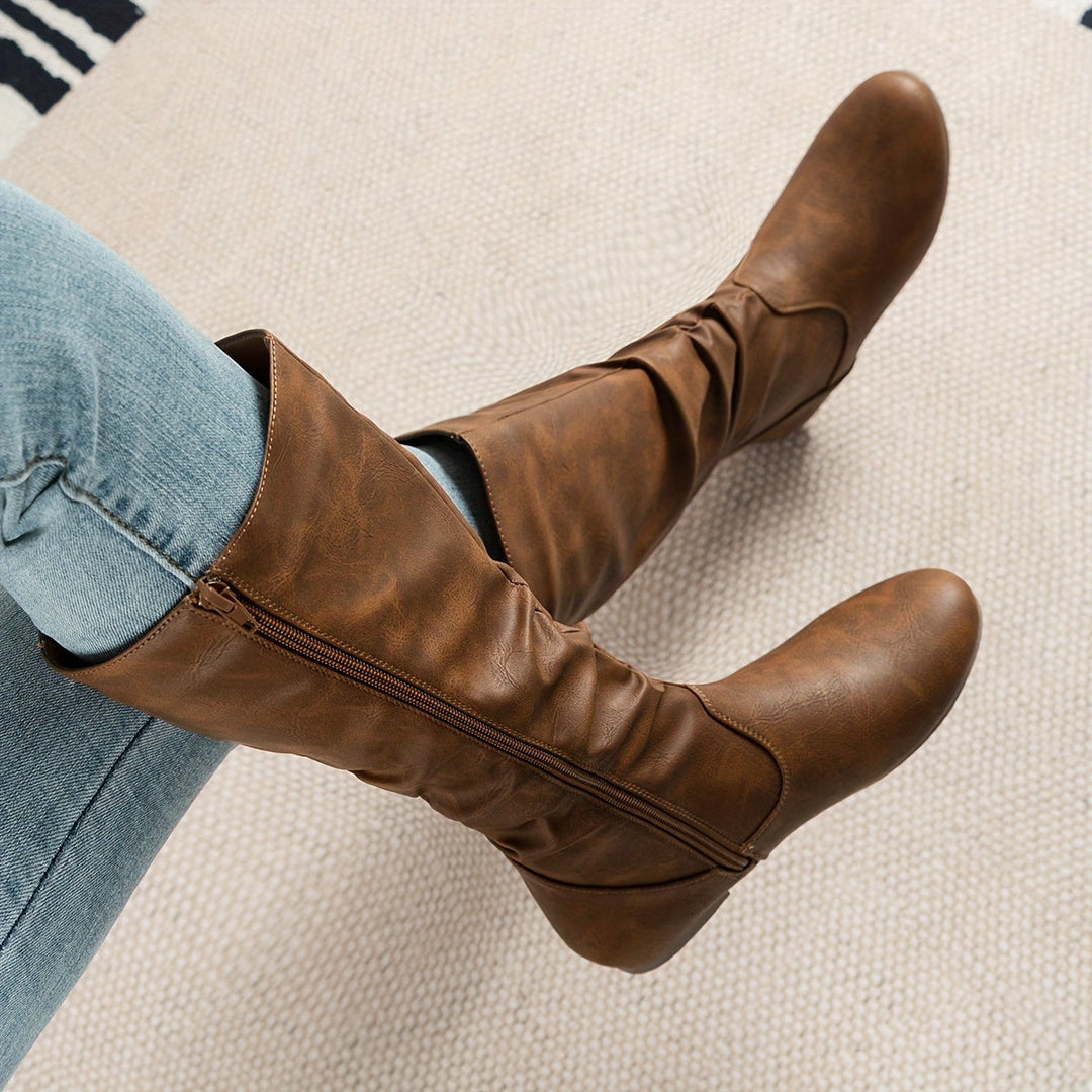 Light brown knee-high slouchy flat boots side view