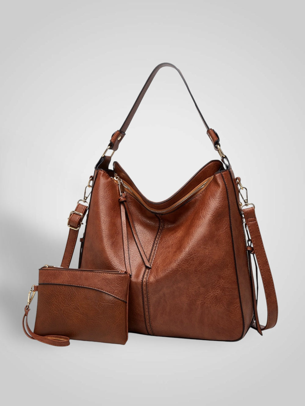 Front view showing top handle, crossbody strap, top zip closure and matching pouch, coffee