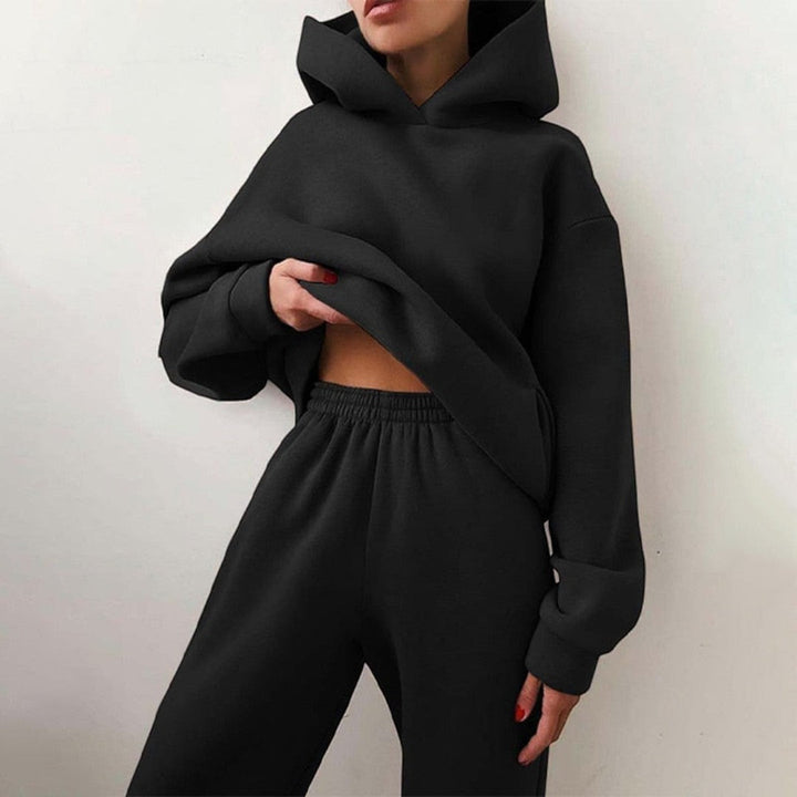 Front view showing hood, long sleeves and banded cuffs
