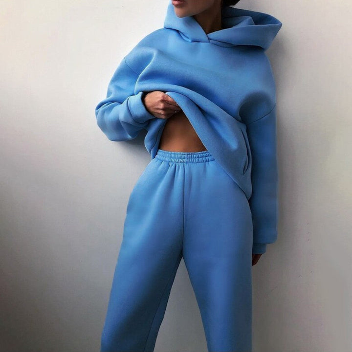 Front view showing hood, long sleeves and banded waist of trousers,