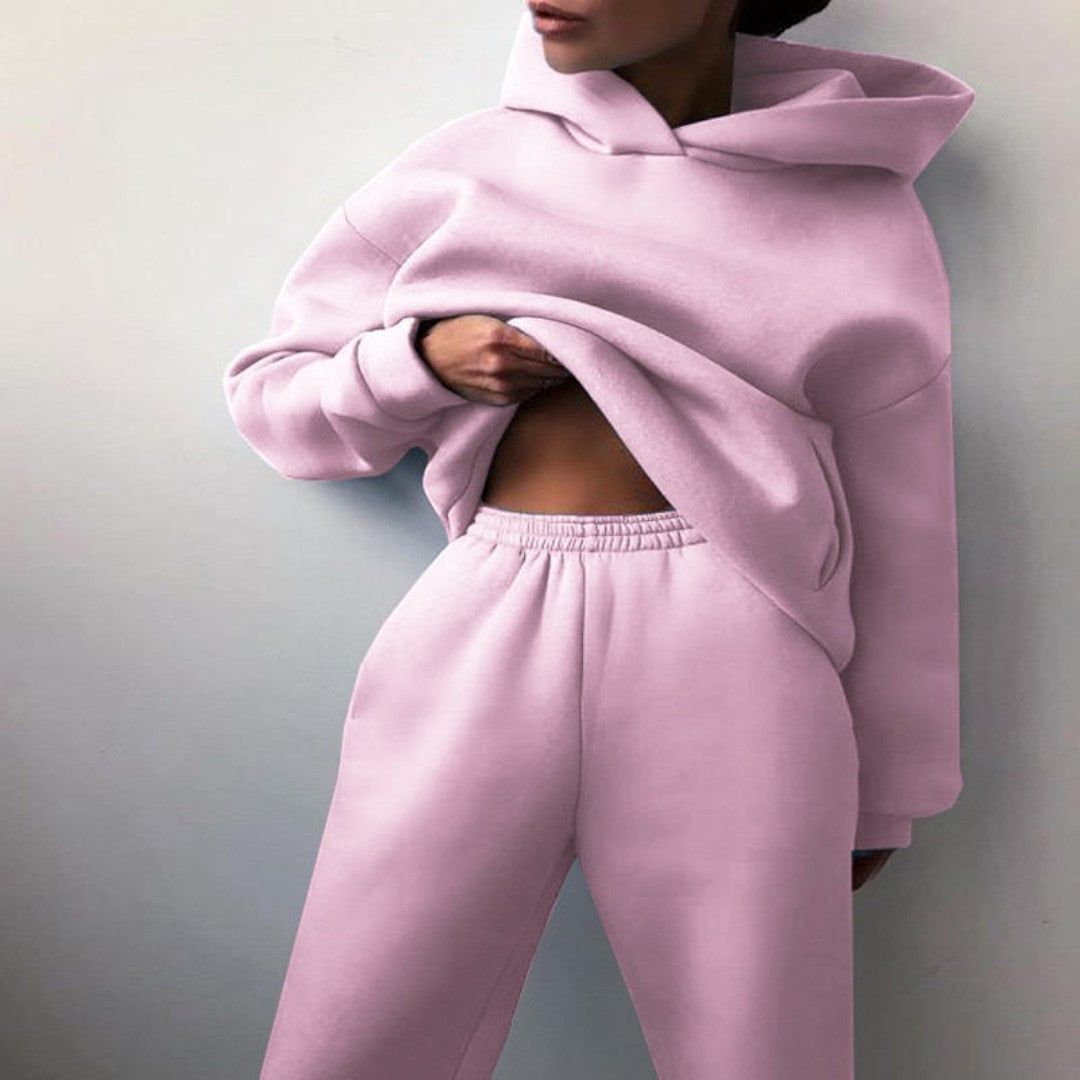 Front view showing hood, long sleeves and banded waist of trousers