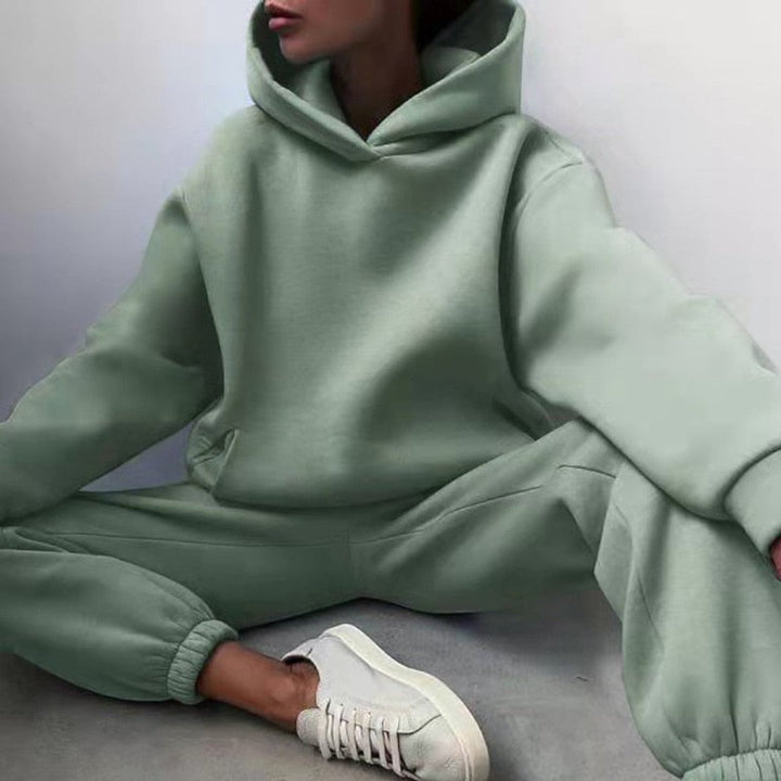 Side view showing hood, long sleeves and banded cuffs of trousers