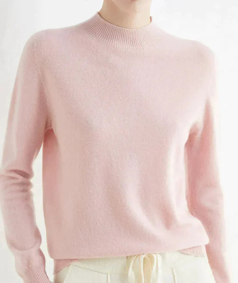 Front view showing mock neckline and long sleeves, pink