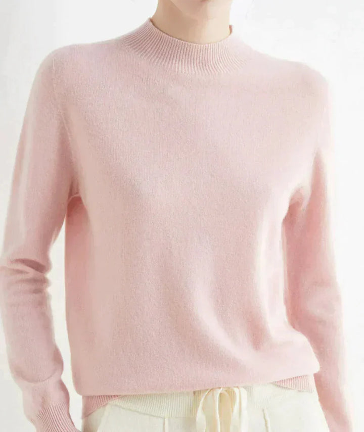 Front view showing mock neckline and long sleeves, pink
