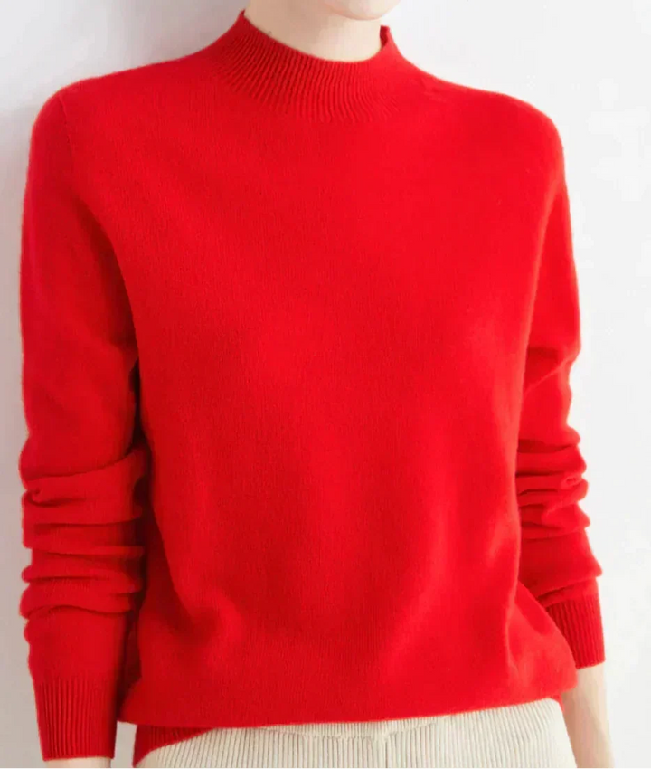 Front view showing mock neckline and ribbed cuffs, red