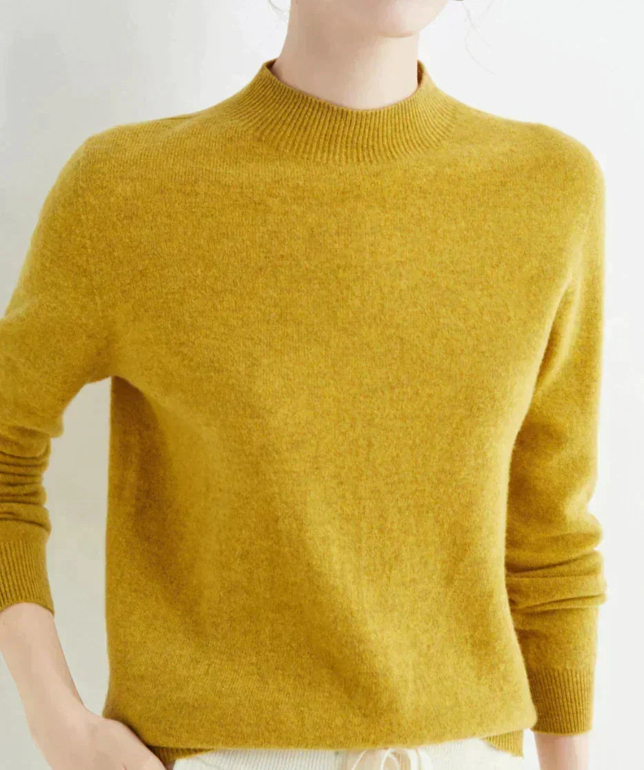 Front view showing mock neckline and long sleeves, yellow