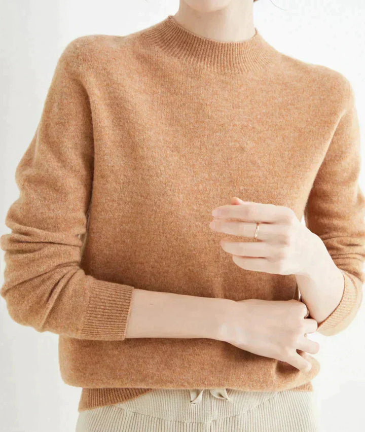 Front view showing mock neckline and long sleeves, light brown