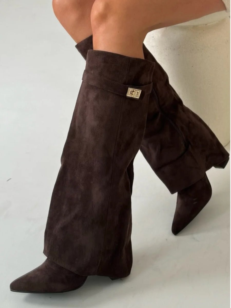 Side view showing fold-over shaft, turn-lock hardware and pointed toe