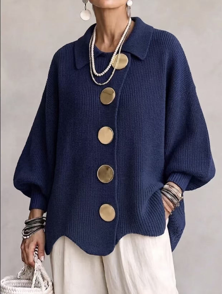 Front view showing shirt collar, button placket and curved hem, blue