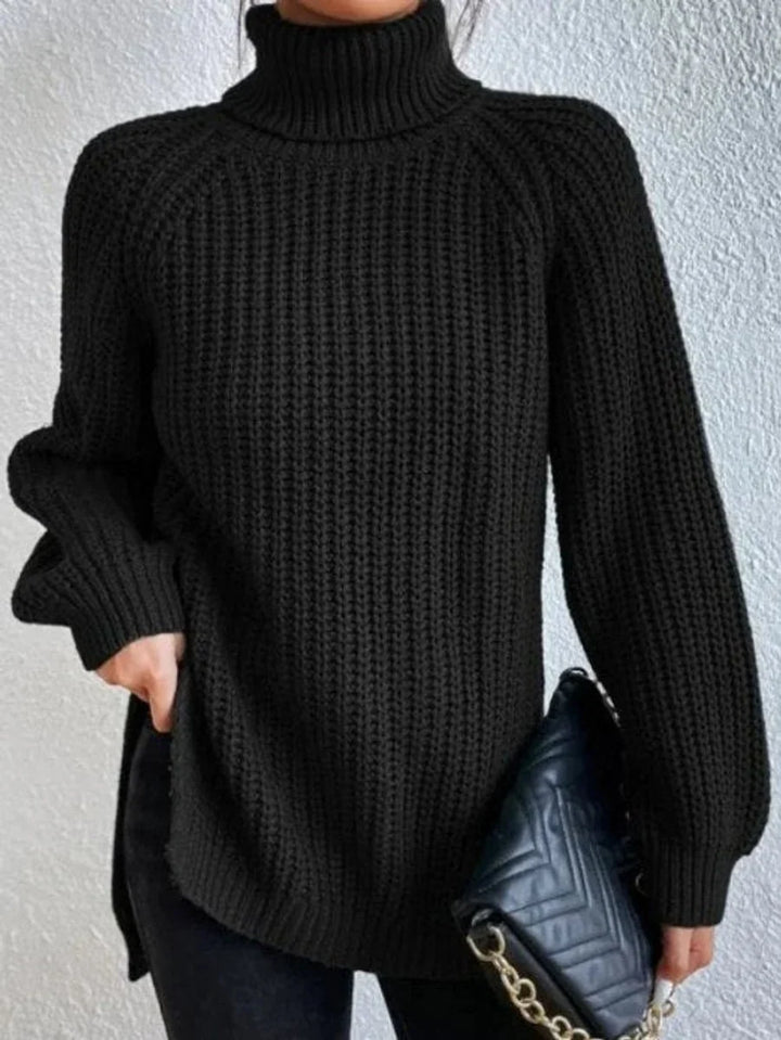 Front view showing turtleneck and raglan sleeves, black