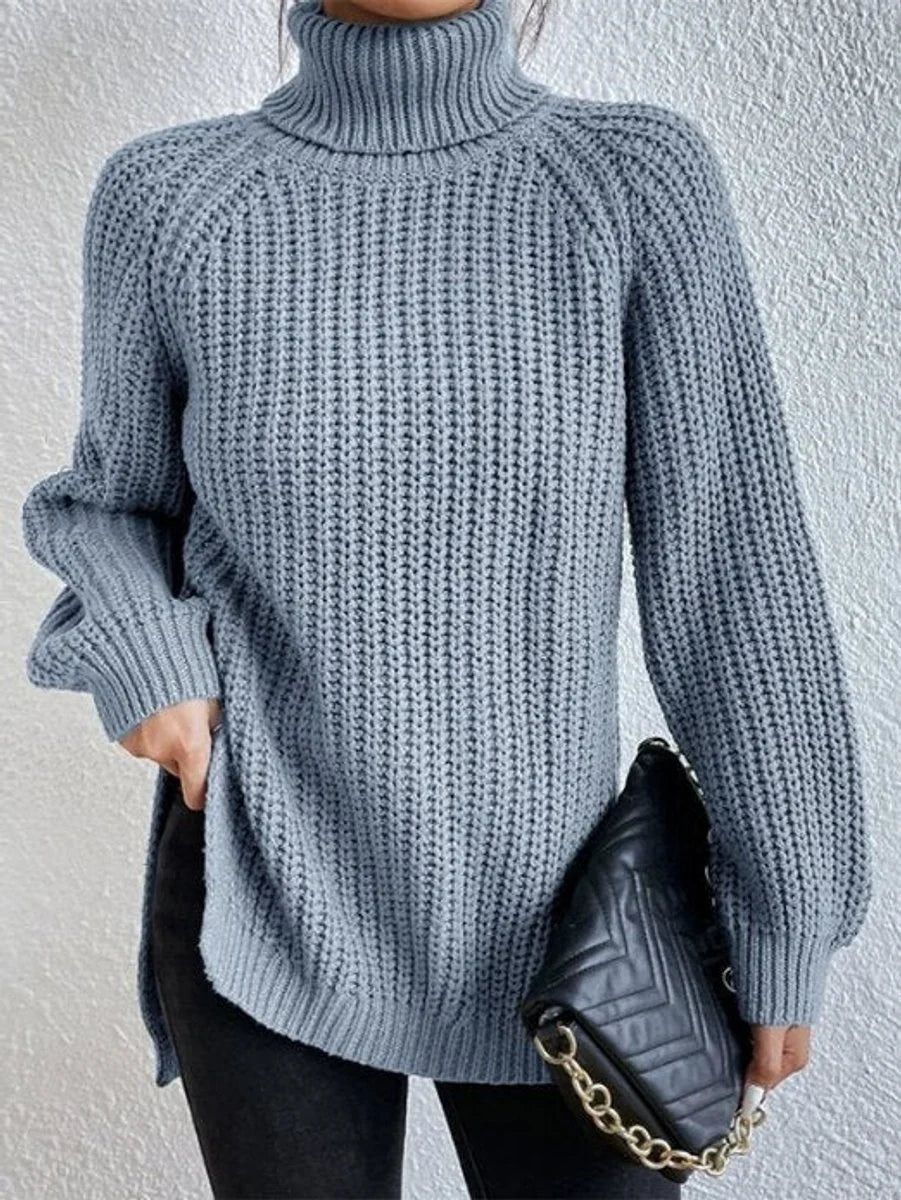 Front view showing turtleneck and banded cuffs, sky blue