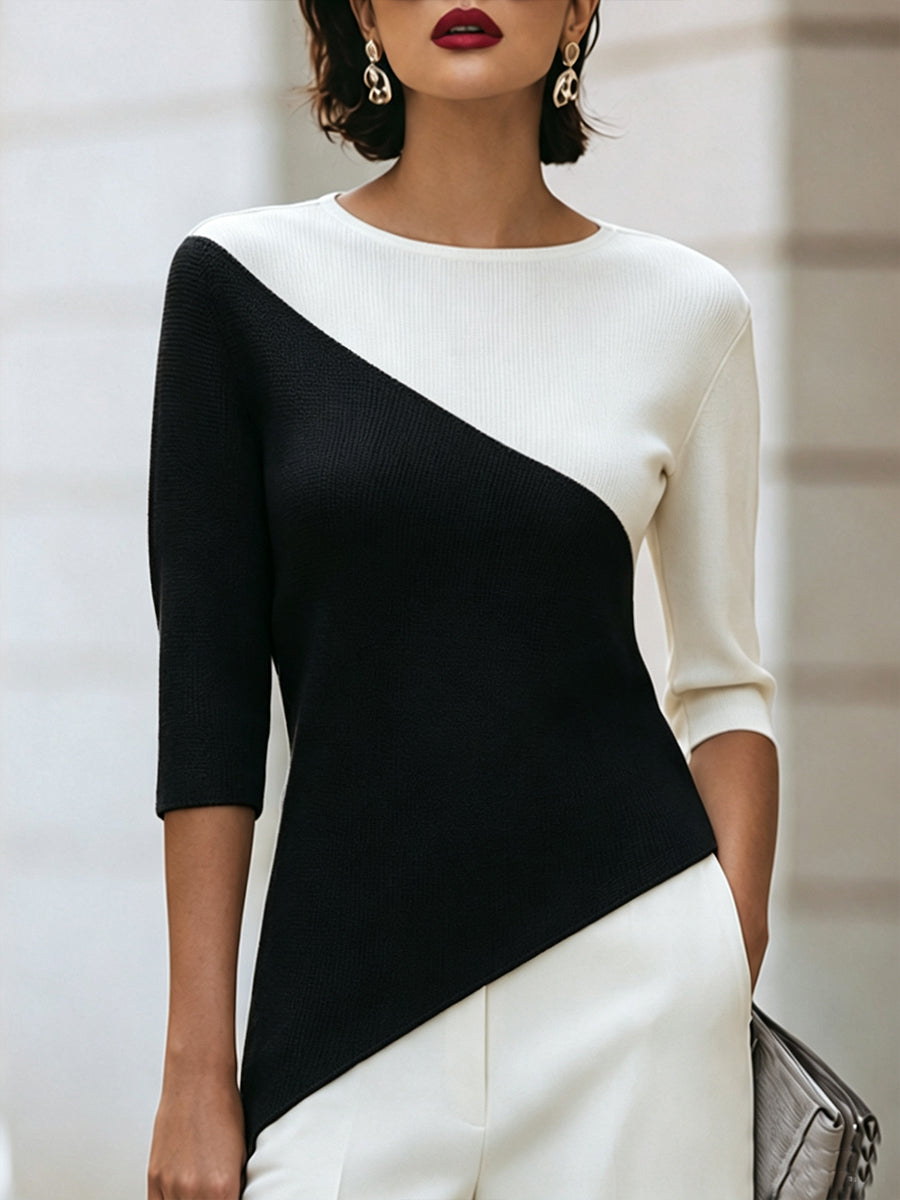 Front view showing round neckline, three-quarter sleeves and colour-block panels, black