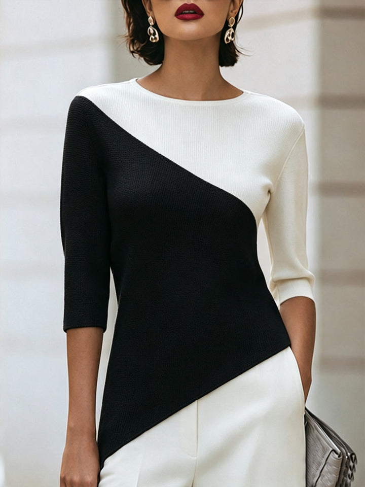 Front view showing round neckline, three-quarter sleeves and colour-block panels, black