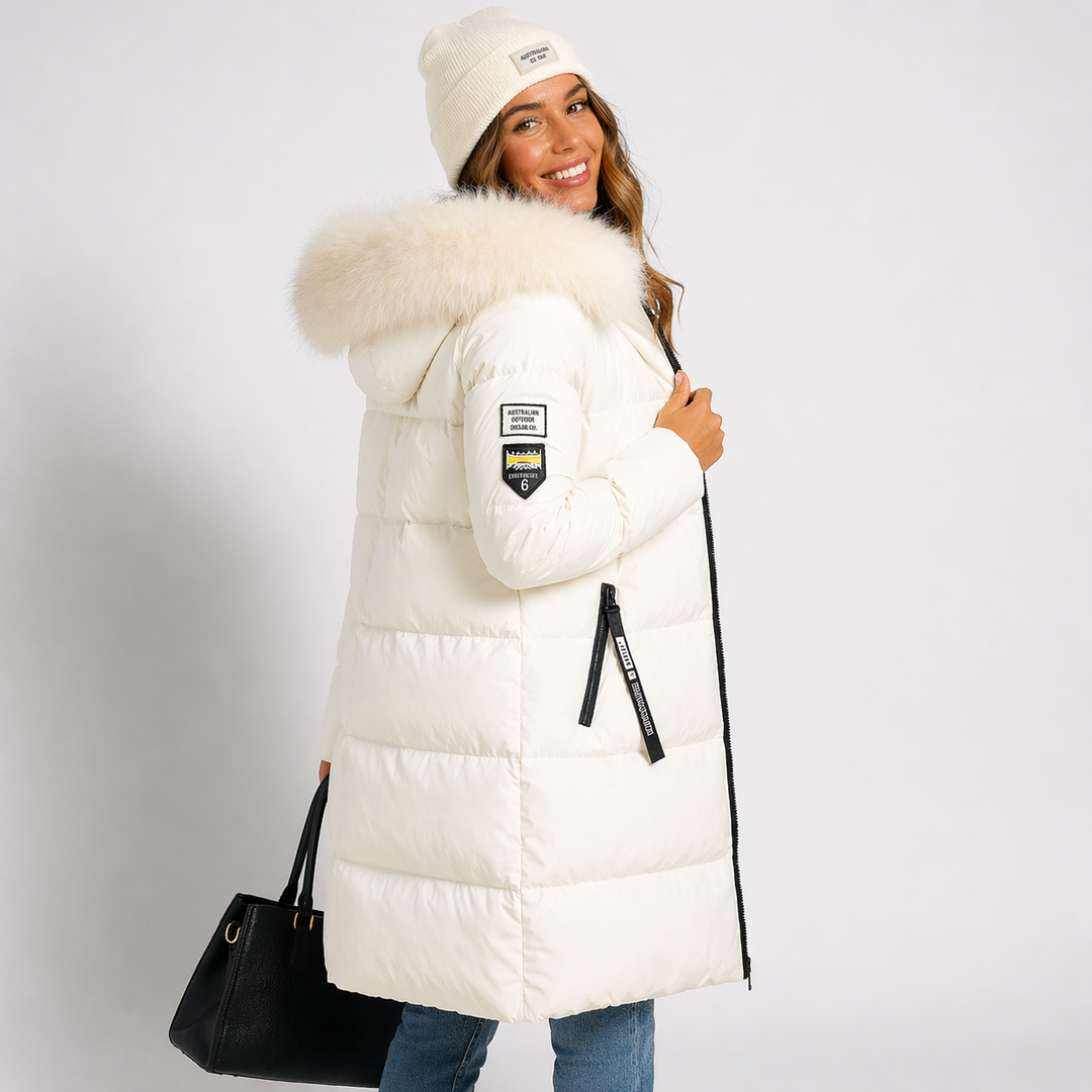 Side view showing hood, long sleeve with patch badge and zip pull, white