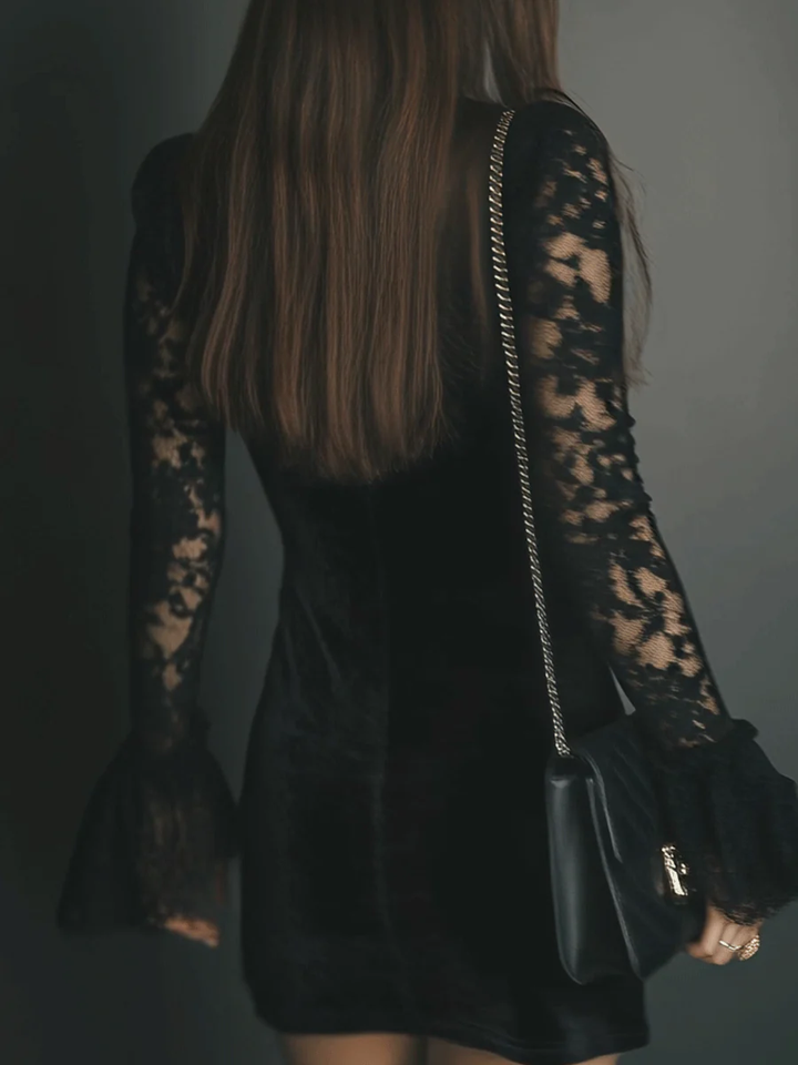 Back view of lace sleeves and ruched skirt