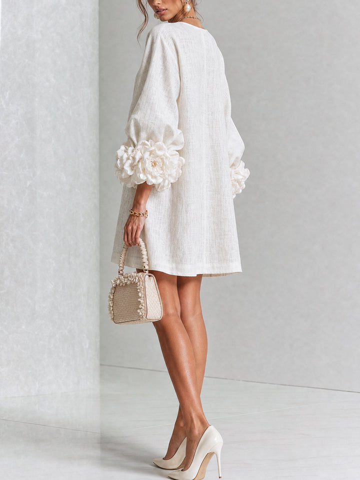 Back view of the dress and rose-shaped cuffs
