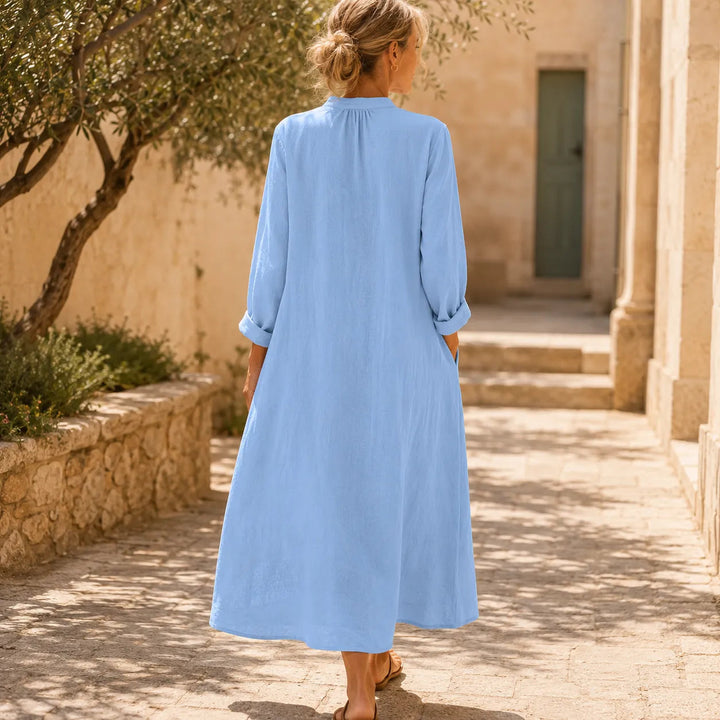 Back view showing gathered back and mid-calf hem
