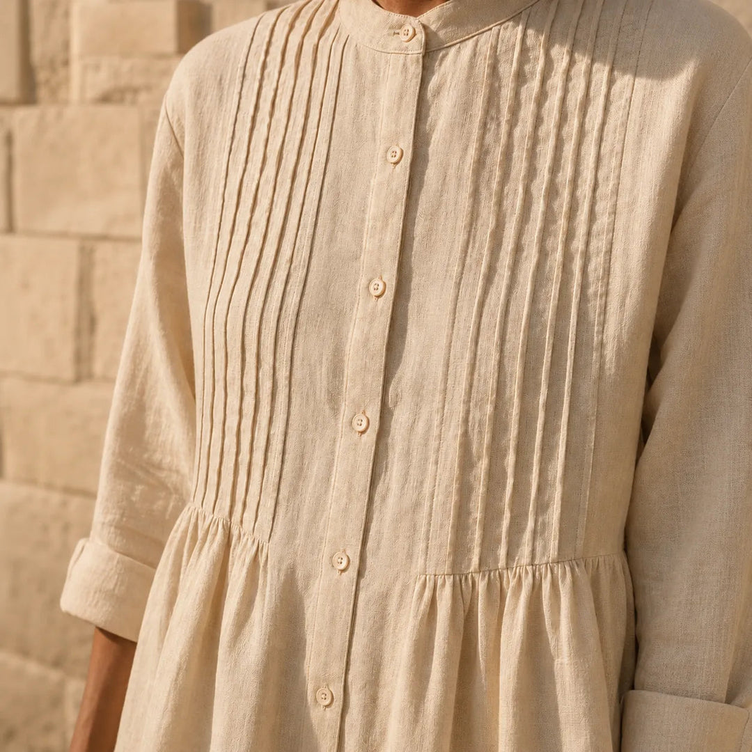 Detail view of pintuck bodice and buttons