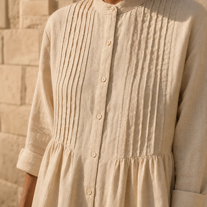 Detail view of pintuck bodice and buttons