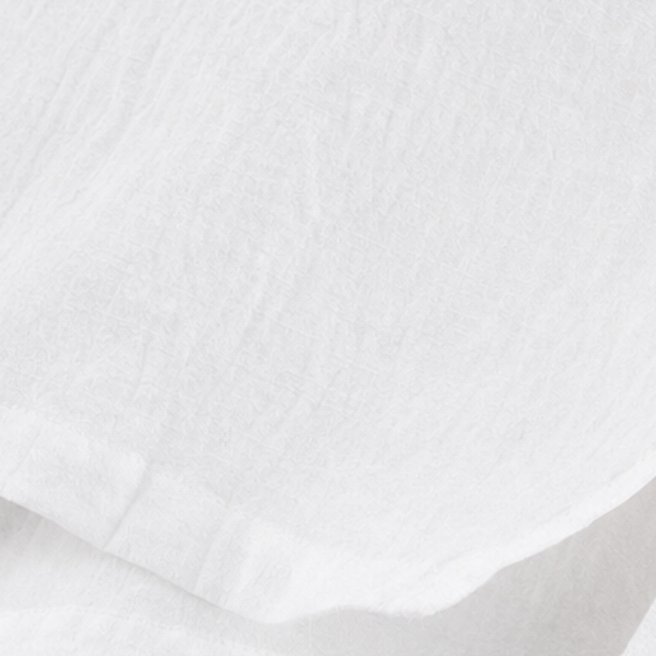 Detail view of the midi dress surface